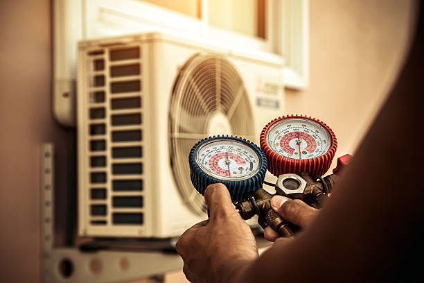 Professional Heat Pump Repair technician working in Griffith, IN